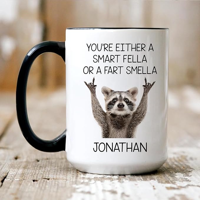 Personalized Funny Raccoon Coffee Mug – Custom Name Cup with Quote “You’re Either a Smart Fella or a Fart Smella” – Unique Gag Gift, White Elephant Christmas Cup